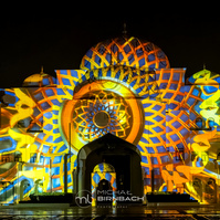 A "Palace in Motion" night light show in Qasr Al Watan presidential palace in Abu Dhabi. Beautiful colors, travel photography. Art photography.
