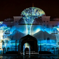 A "Palace in Motion" night light show in Qasr Al Watan presidential palace in Abu Dhabi. Beautiful colors, travel photography. Art photography.
