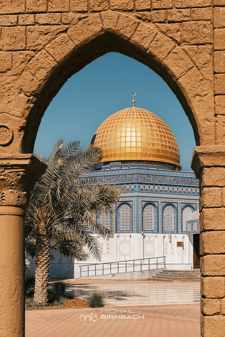Bani Hashem mosque.  beautiful example of classical Arabic architecture. The combination of the blue mosaics on the walls with the golden dome. Travel photography