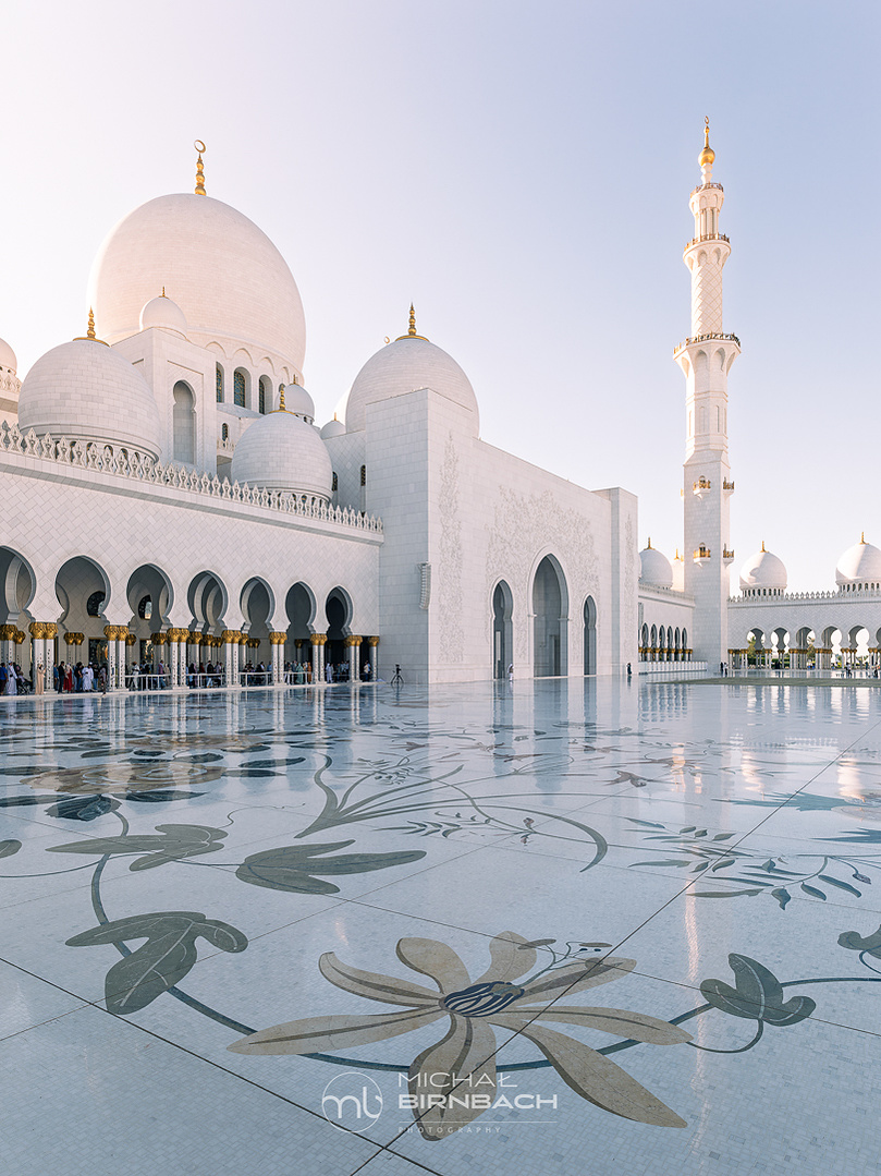 Sheikh Zayed Grand Mosque is one of  top travel landmarks in Abu Dhabi. This is a beautiful travel photography shot inside the mosque. Amazing minimalistic arabic architecture. Especially beautiful white marble floors.