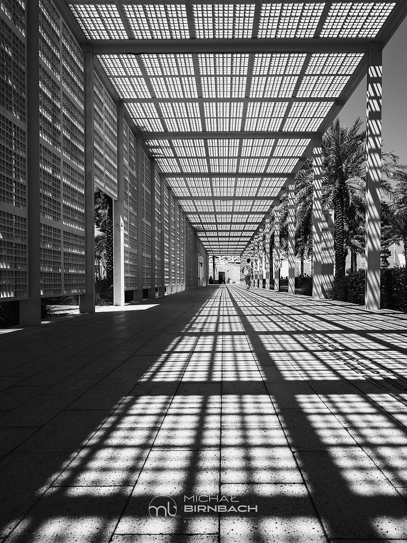 Entrance to the Abu Dhabi Louvre museum. Black and White art photography, travel photography. UAE.