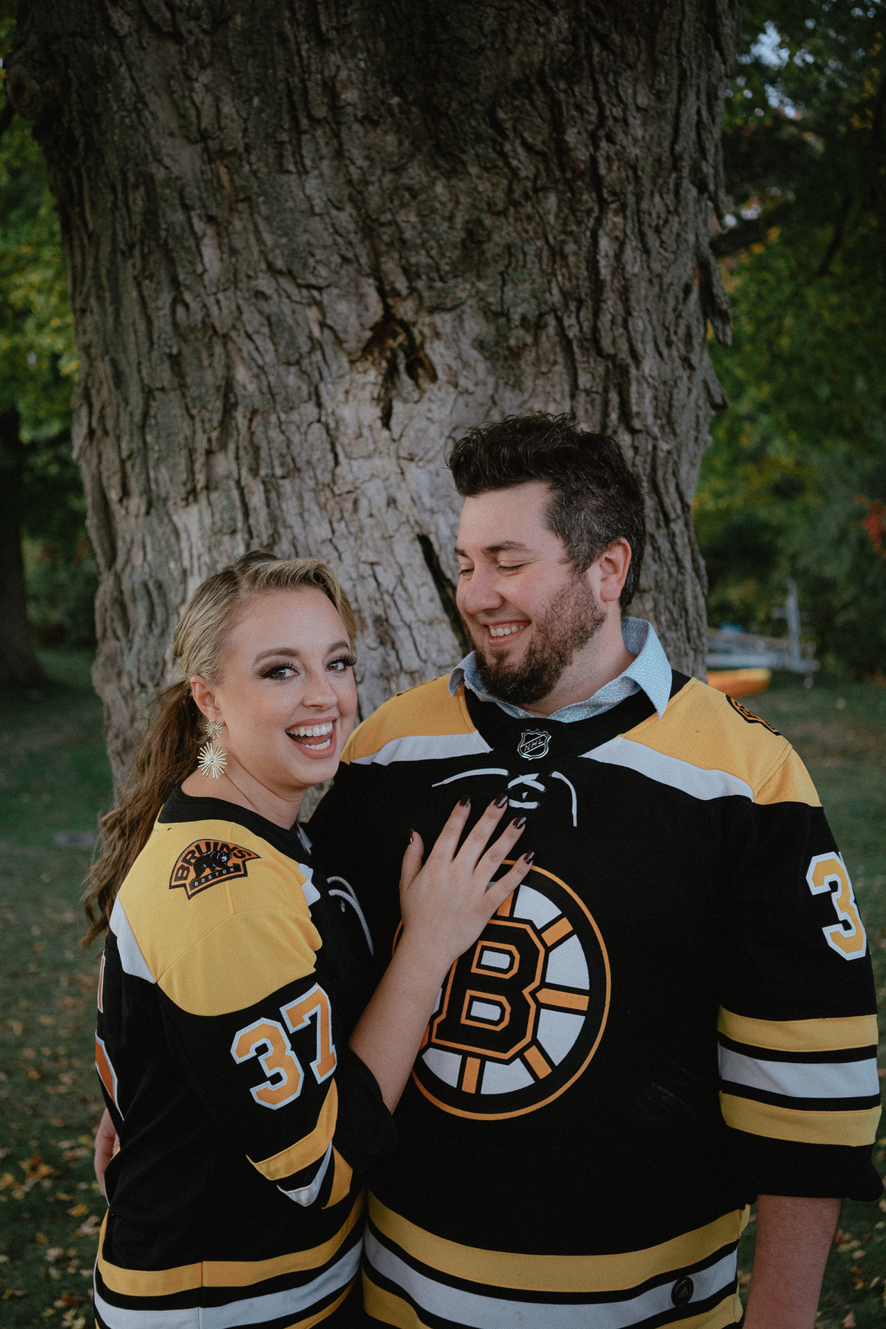 Bruins fans during engagement photography session.
