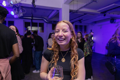 Person laughing at Spit Nights, 2025
