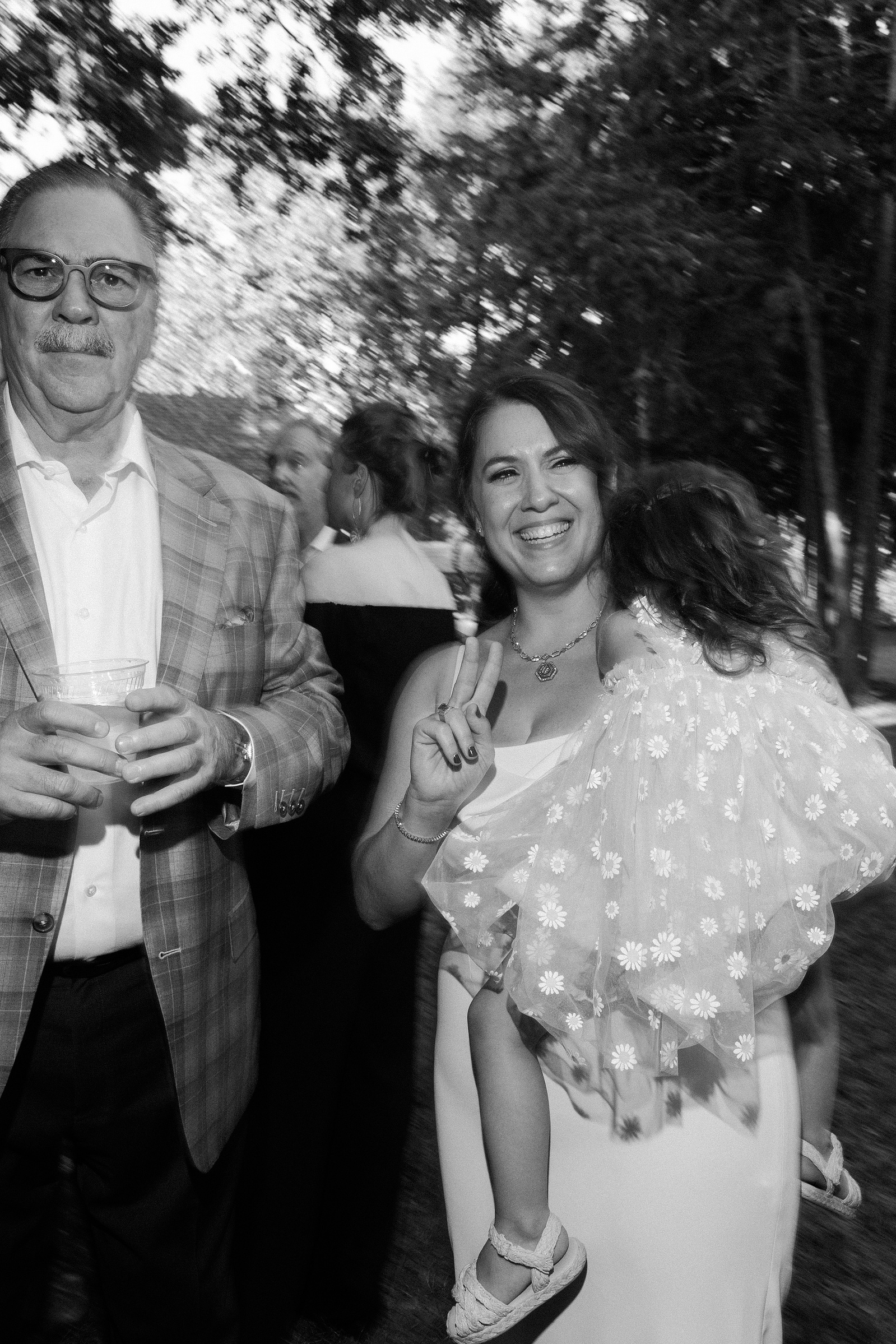 Wedding guests at cocktail hour. Wedding photojournalism at Senate Garage in Kingston, NY.