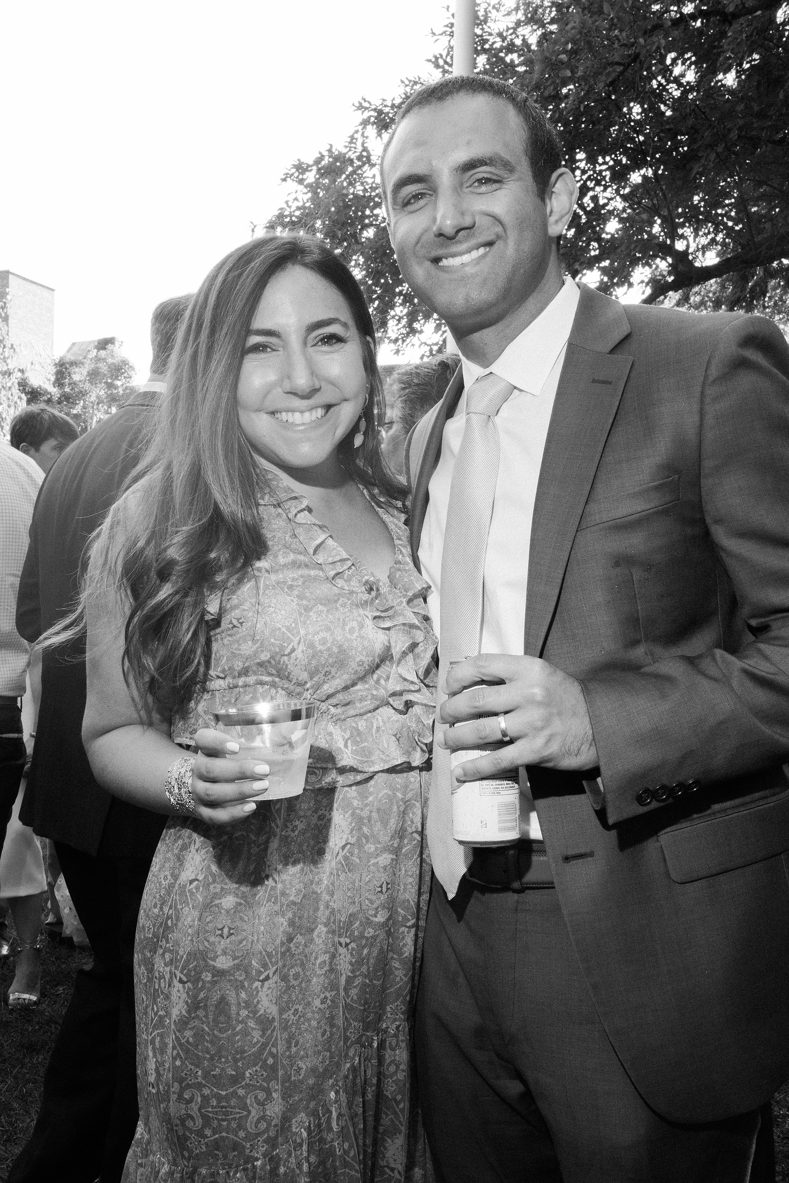 Two wedding guests pose for a picture. Wedding photojournalism at Senate Garage in Kingston, NY.