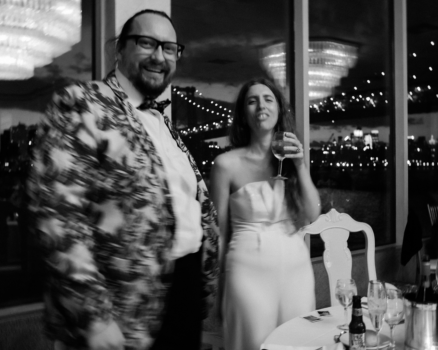 Bride and groom at reception. Wedding photojournalism at Giando on the Water in Brooklyn, NY. 