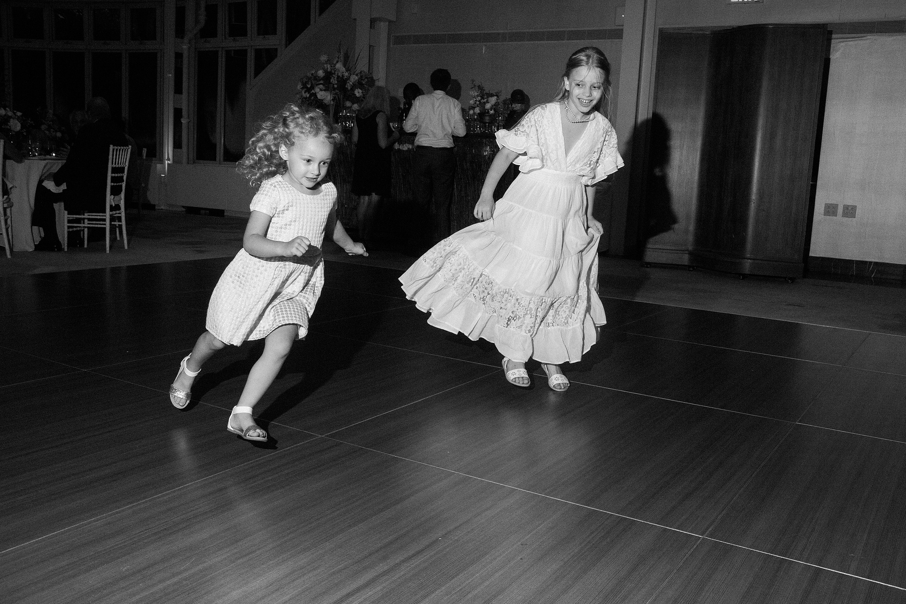 Brooklyn botanical gardens summer wedding reception with kids dancing. Corey Torpie Wedding Photojournalism.