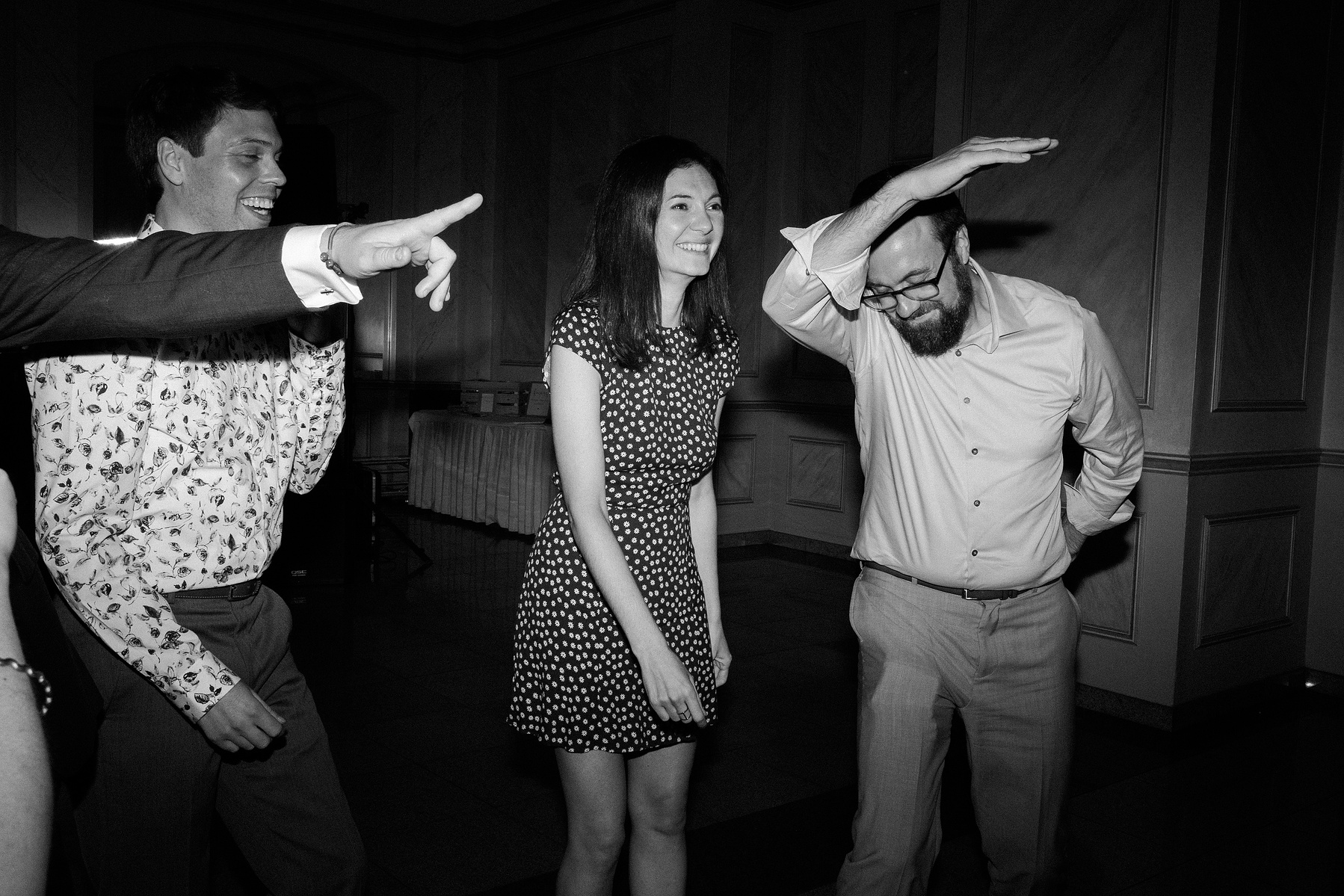Wedding guests dancing. Wedding photojournalism at Giando on the Water in Brooklyn, NY. 