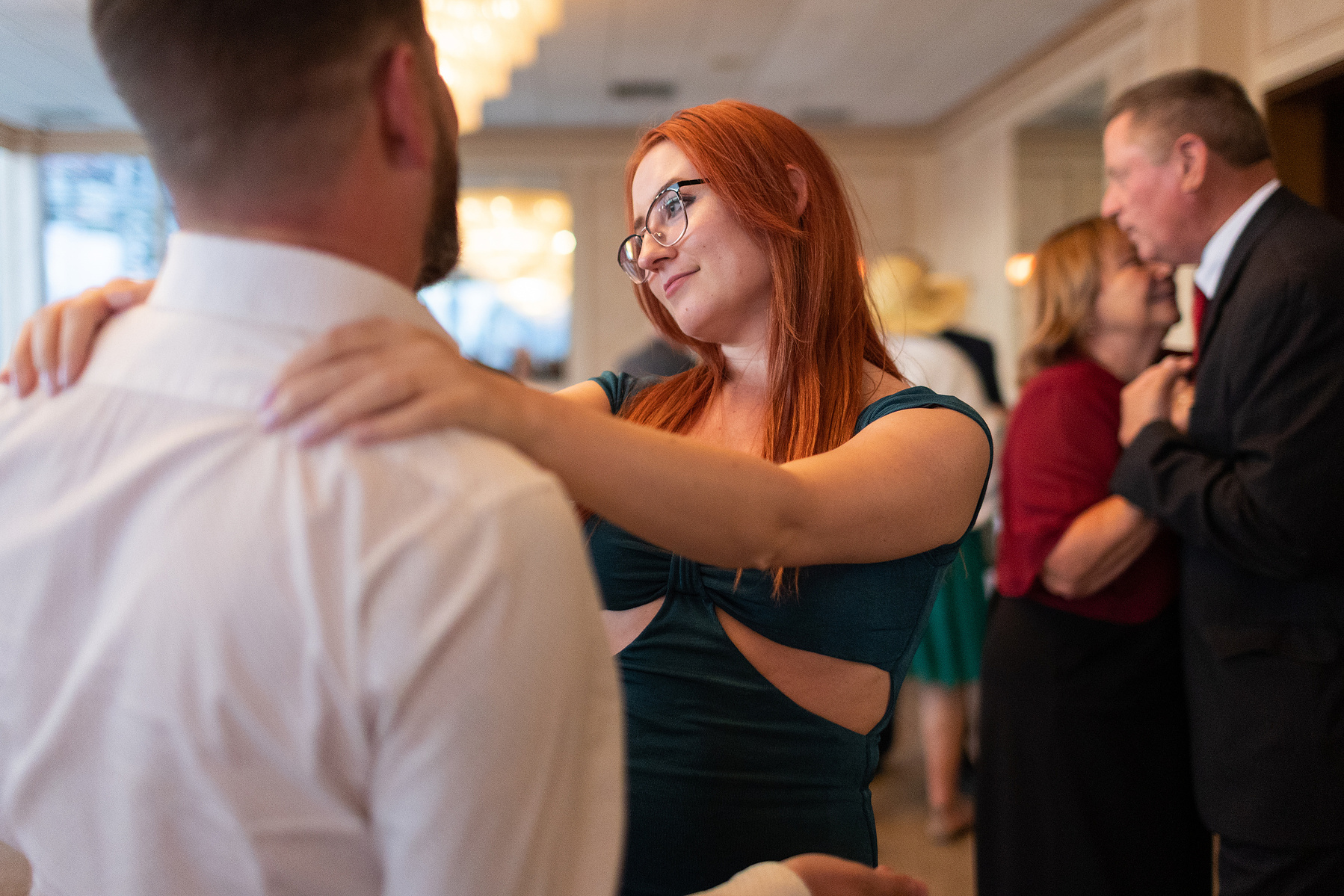 Wedding guests dancing. Wedding photojournalism at Giando on the Water in Brooklyn, NY. 
