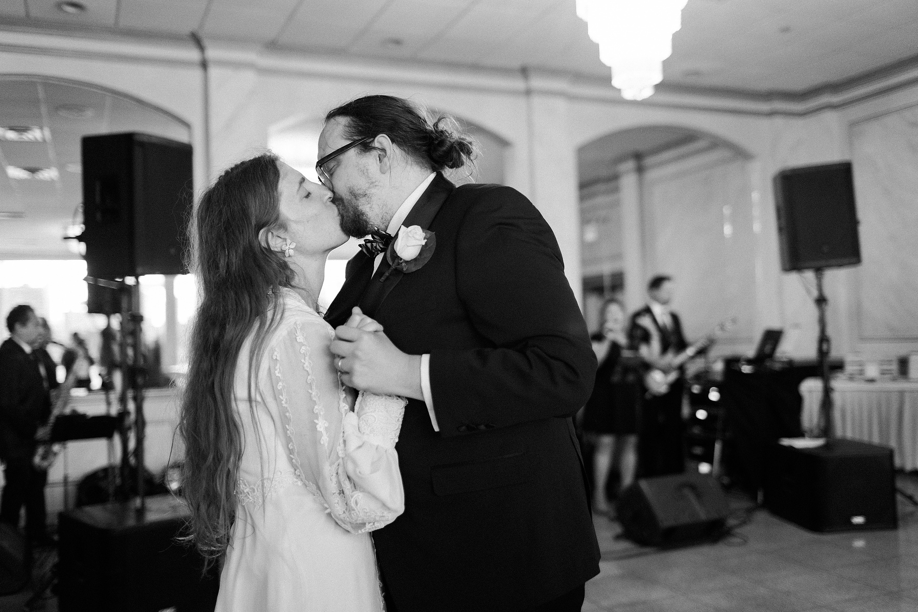 Bride and Groom first dance kiss. Wedding photojournalism at Giando on the Water in Brooklyn, NY. 