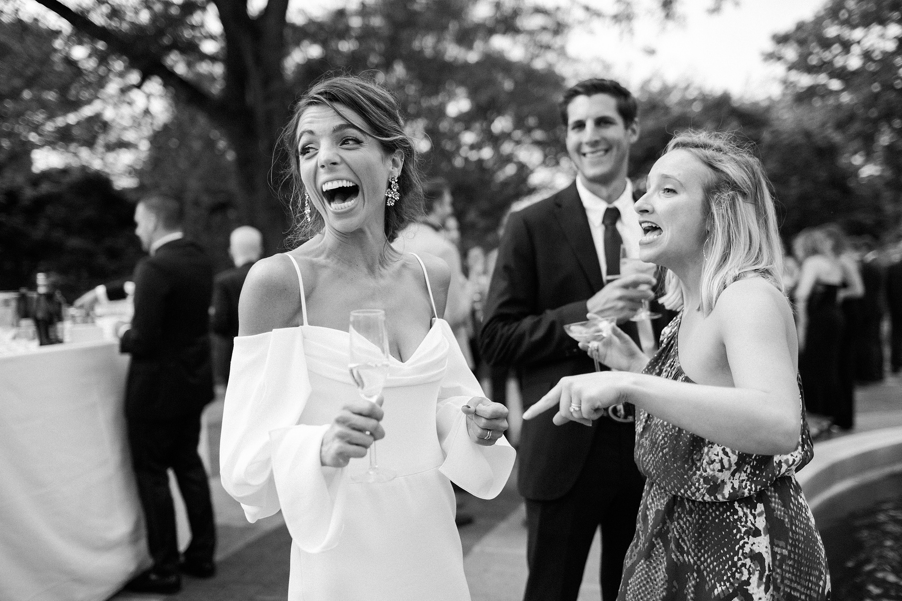 Brooklyn botanical gardens summer wedding guests at cocktail hour. Corey Torpie Wedding Photojournalism.