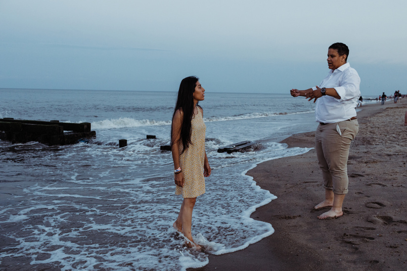 Alexandra Rojas of Justice Democrats talks water conservation policy with candidate Kerri Evelyn Harris in Delaware during a visit to Dewey beach and boardwalk.