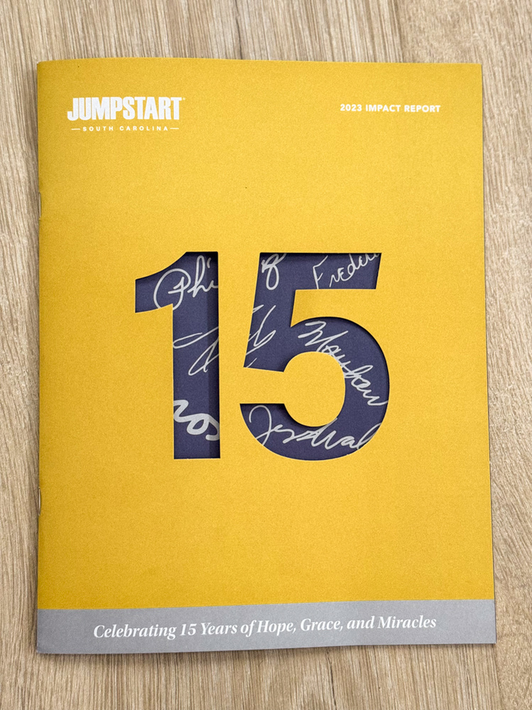 Jumpstart impact report die-cut cover design