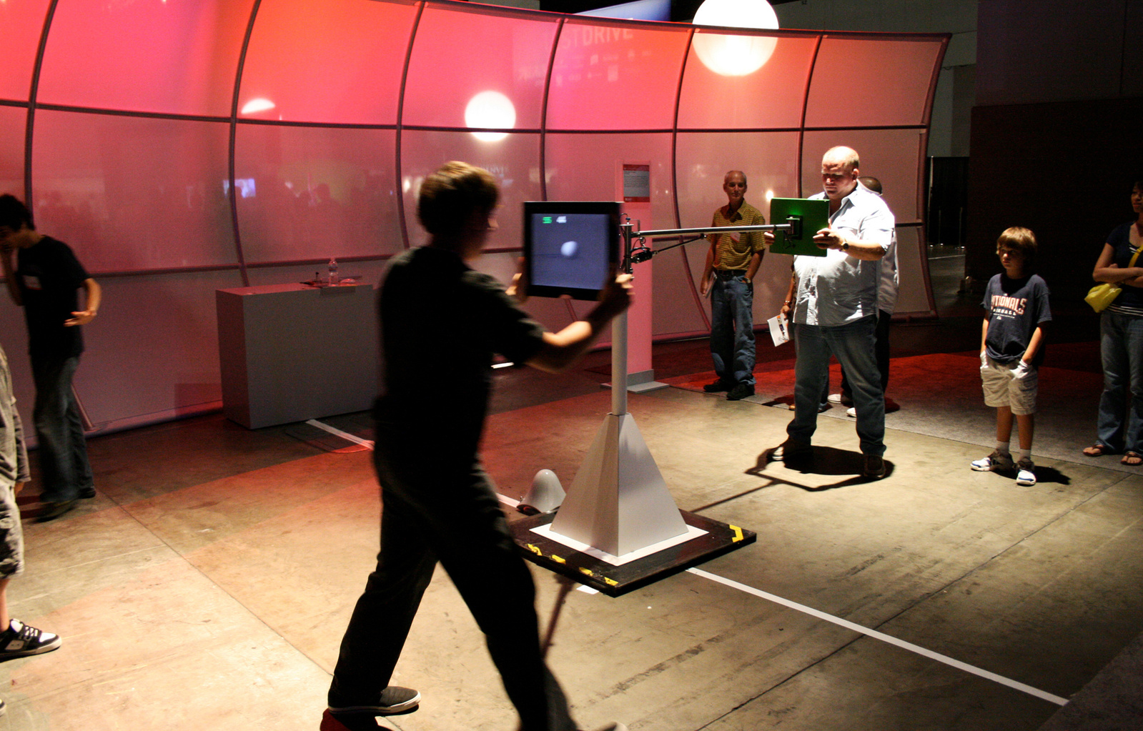 TFT Tennis is an interactive game installation with two computer screens as interface inspired by the classic Pong. Photo taken at Wired NextFest Los Angeles.