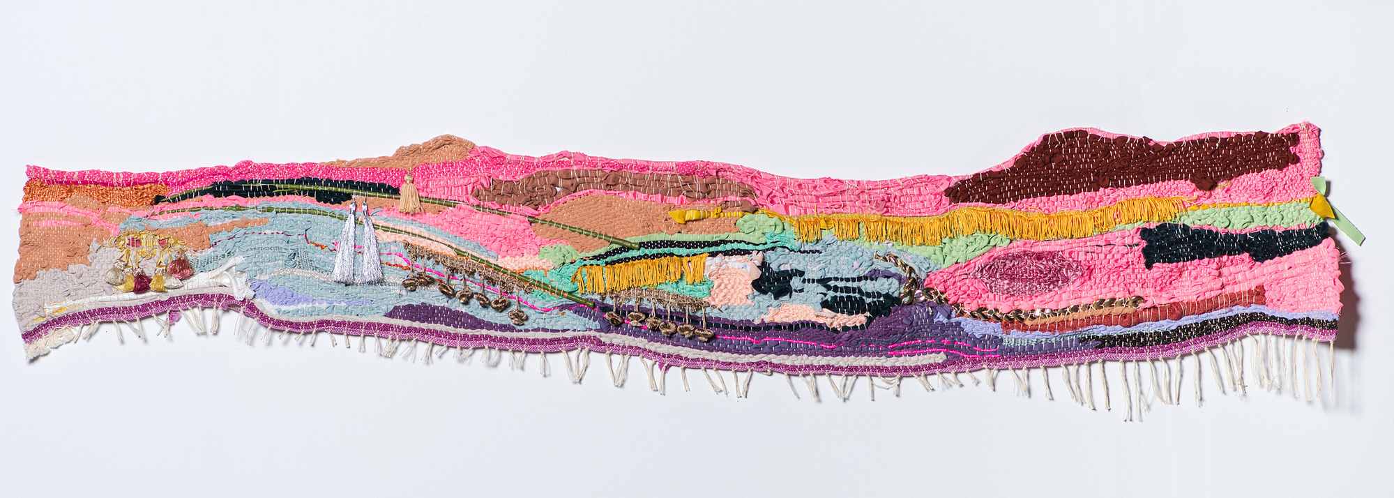 Collecting Pile Horizon 1 of 3. Pink tapestry made of donated objects with group participation