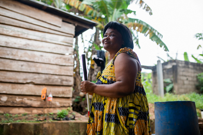 Eveline Angonwi, 50 years old, is the President of the Cameroonian Committee of women with visual impairments. She went blind on the night of International Women's day nine years ago after drinking a glass of whisky while she was partying with her girl fr
