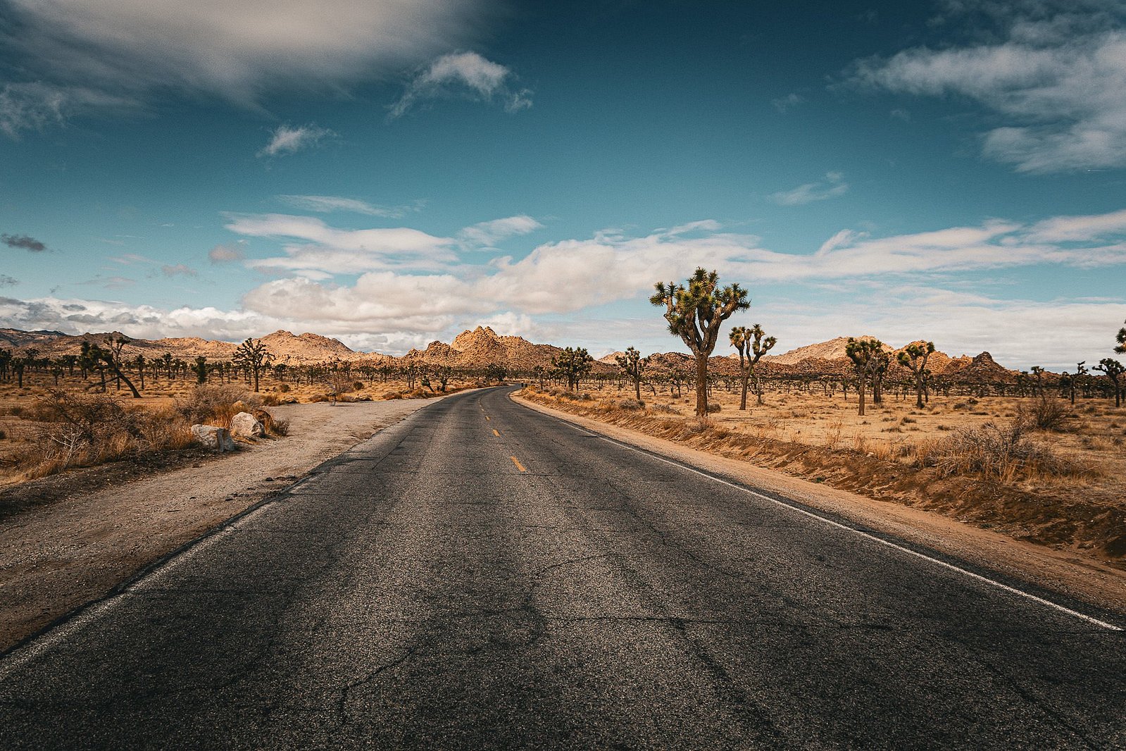 Desert Shot of a long winding road through the desert.