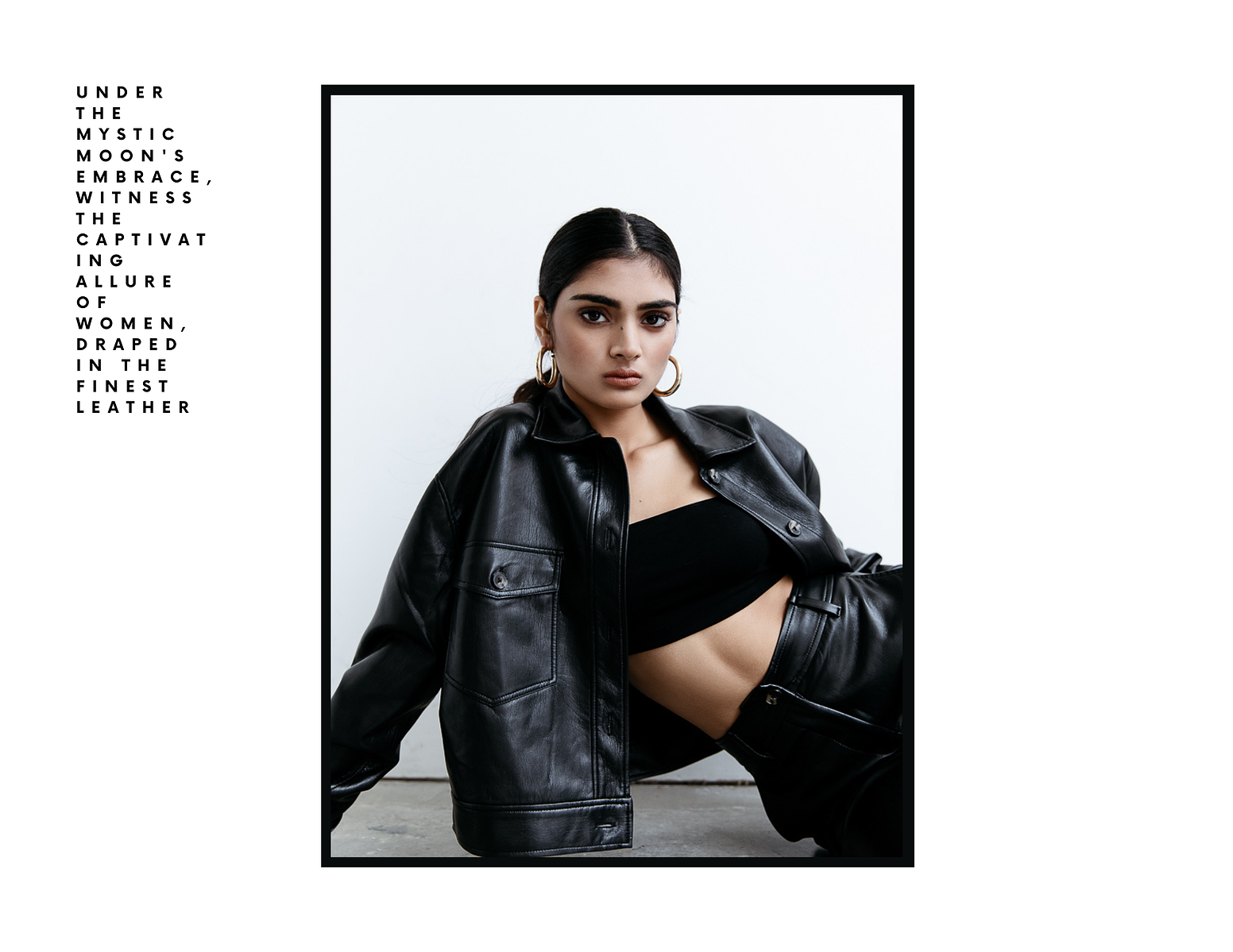 vintage black leather, motorcycle girl aesthetic, big hoops, black bandeau outfit, black bandeau top outfit aesthetic, all black aesthetic, photo studio, professional photographer, ford models, female modeling poses photography, Indian-American model