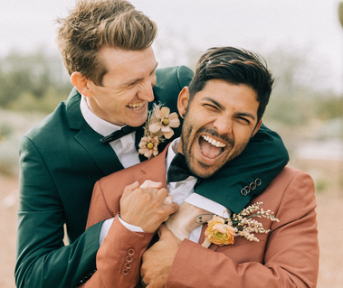 Gay Wedding Videography. Men hugging and loving each other after getting married.  Wedding Videos Colorado.