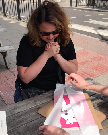 The unboxing of a custom Pet portrait by Woof Portraits featuring Bob the Fox Terrier. Physical fine art giclée print. Outside the Morgan Arms pub. 