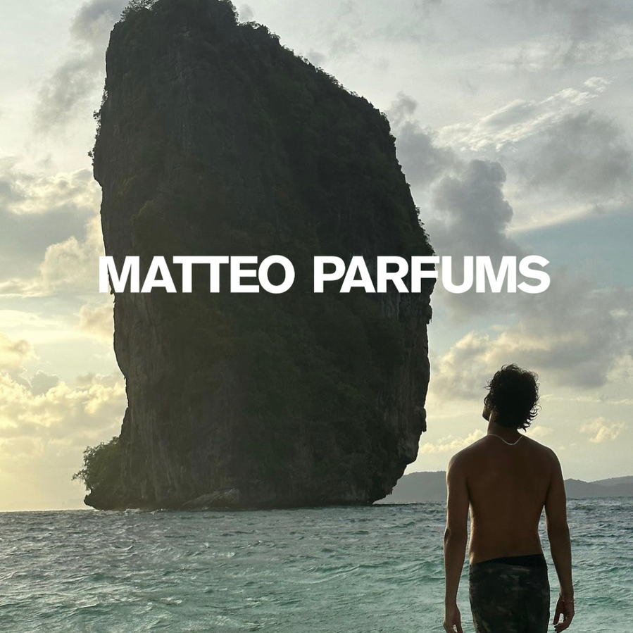 Lovers' Dew (100ml) bottle of clean, luxury niche fine fragrance eau de parfum from MATTEO PARFUMS by Matthew J. Sánchez. Aquatic, fougère, citrus, clean beauty. Aztec, cactus prickly pear, light blue. White Tuscan Italian marble cap. Refillable.