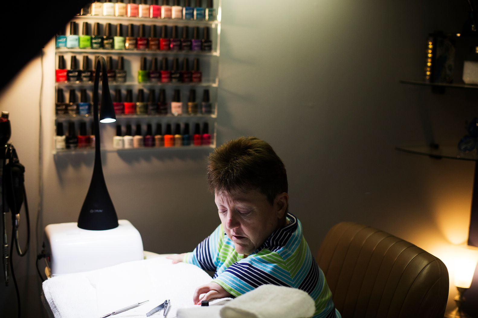 Thalidomide victim Sandy Hatch receives a manicure for the first time at a salon in Hamilton, Ontario on January 23, 2015. She has always feared that people wouldn't want to touch her disfigured hands. (Michelle Siu for The Globe and Mail)