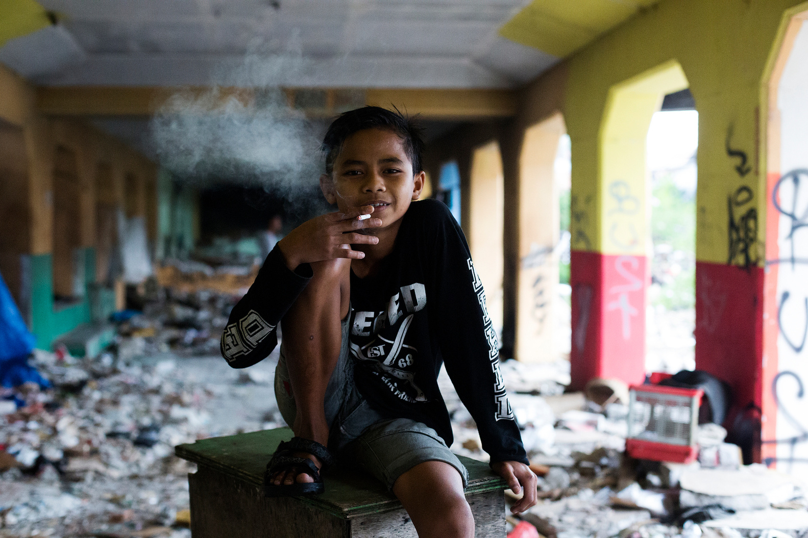 Tarno Or Owong smokes a few cigarettes per day and his favourite brand is Samporna Mild on March 26, 2015. (Photo By: Michelle Siu)