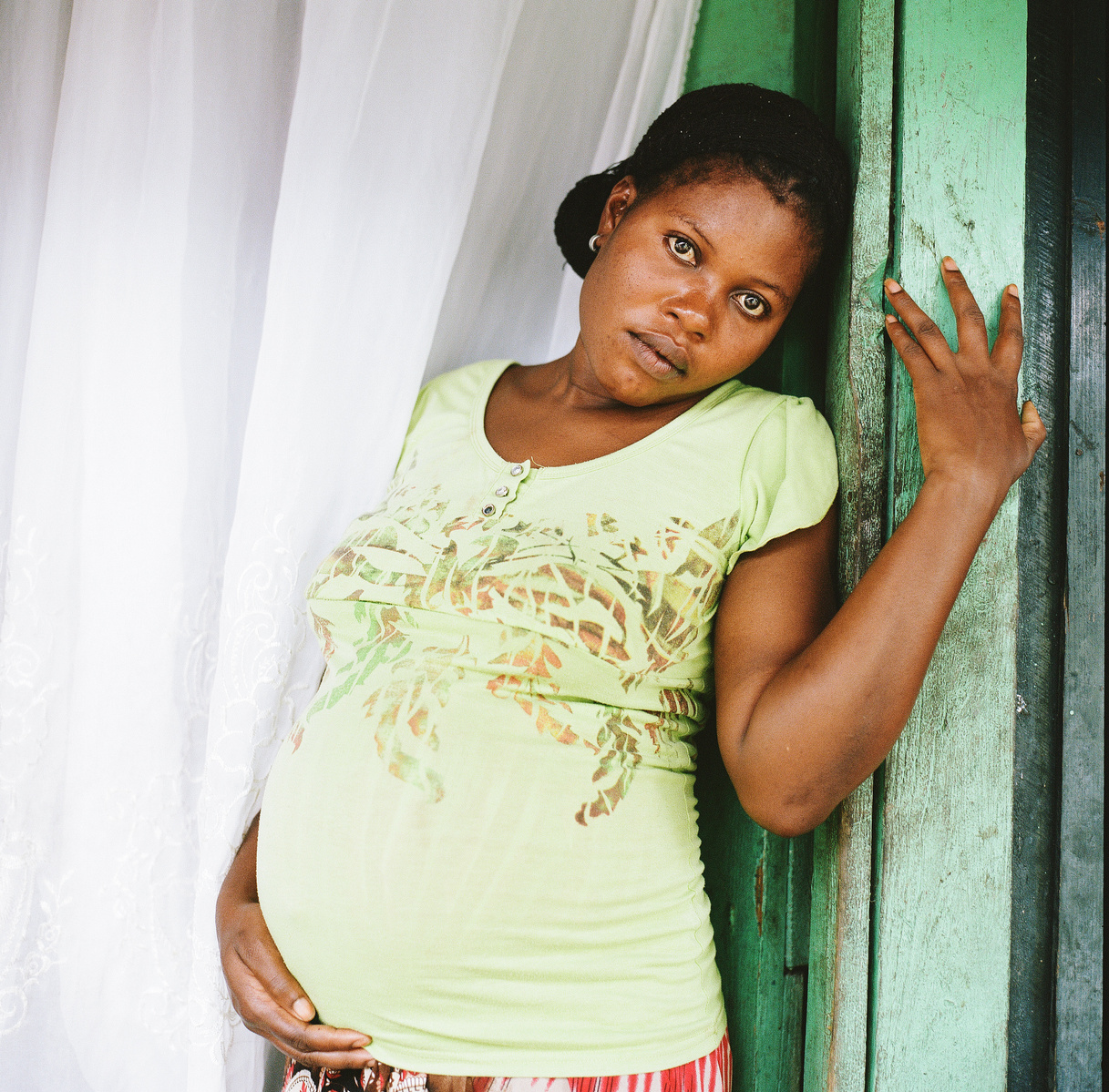 Daniel Policap who is of Haitian decent and lives in a Sugarcane worker's town in El Seibo, Dominican Republic is at risk of being deported and she is worried her unborn child will be born in Haiti or will not receive Dominican identification. She didn't