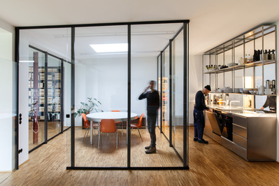 ALTE SCHLOSSEREI  or  OLD LOCKSMITH SHOP is an architecture project by ALAS Architects in Berlin. The space is a house and working studio for designers and artists. These are architecture photographs of the interior and exterior of the building. 