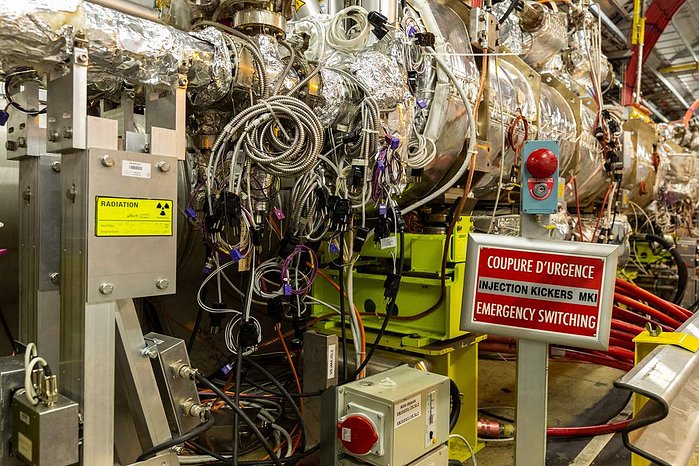 Signs of radiation and an emergency switch in one section of the Large Hadron Collider (LHC) at the CERN (European Organization for Nuclear Research) particle physics research facility, Meyrin, Switzerland.