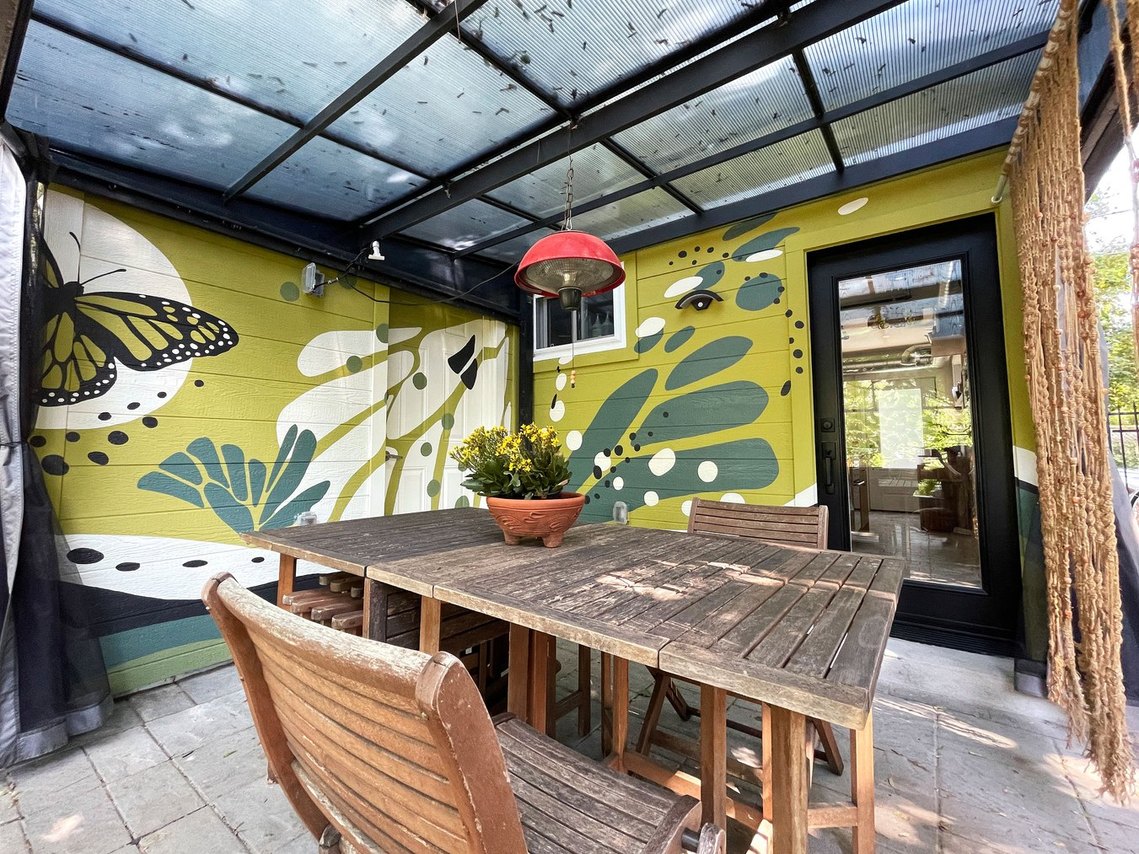 The two patio walls are designed with an abstract pattern of shapes from Monarch Butterfly wings. 