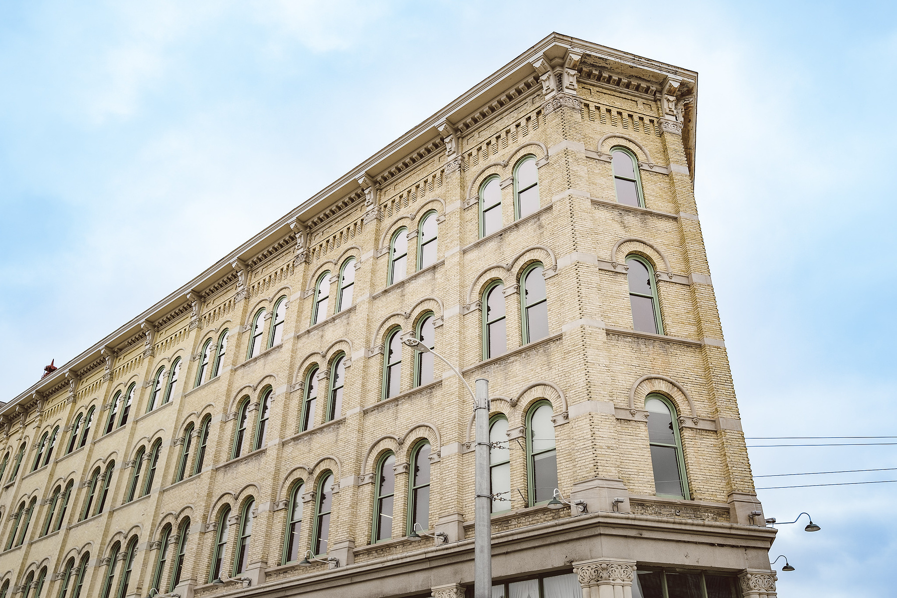 The Pritzlaff is one of the best wedding venues in Milwaukee, Wisconsin.  This photograph is a color, wide angle shot of the exterior of the building which is made of "cream city brick".