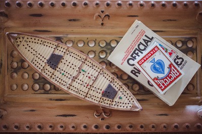 cribbage board and cards in a top down photograph of bridal prep details in Milwaukee, Wisconsin.