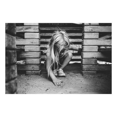 family photography of young girl playing at the playground in Milwaukee, Wisconsin.