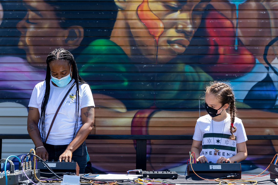 Black girl with Moog modular synthesizer afrorach