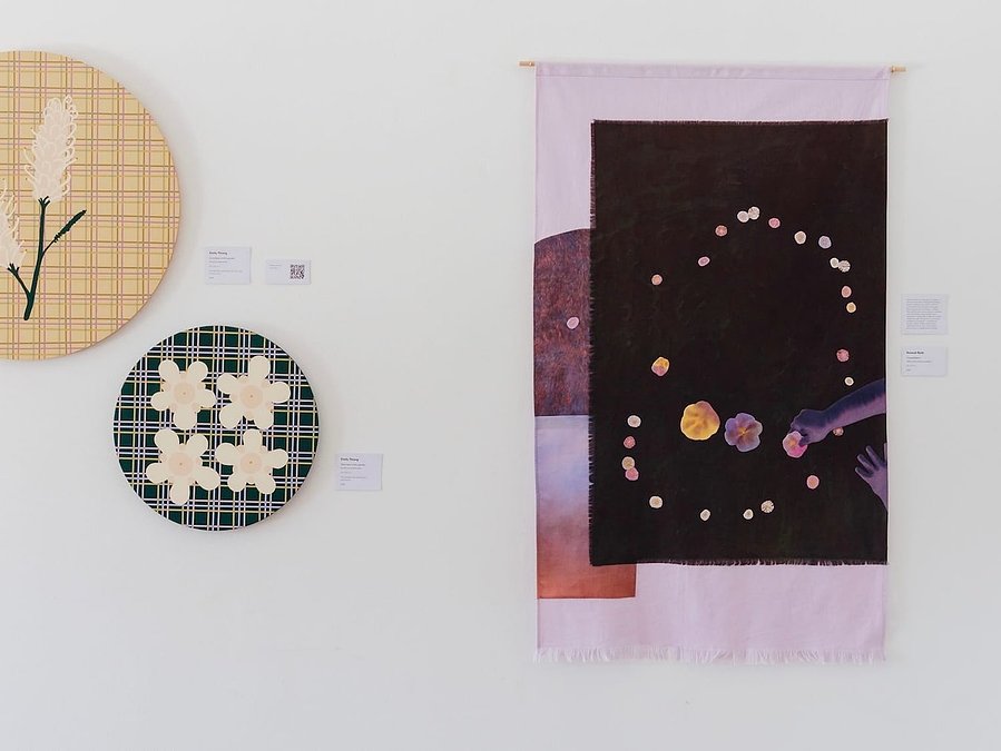An install shot of Constellation alongside artworks by Emily Thiang, on a white gallery wall.
