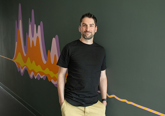 A create lifestyle business portrait taken onsite in a professional office environment/setup
