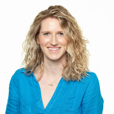 A studio style head and shoulders portrait taken onsite at PepsiCo Dublin offices using a white background