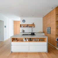 Modern kitchen made from concrete and wood.