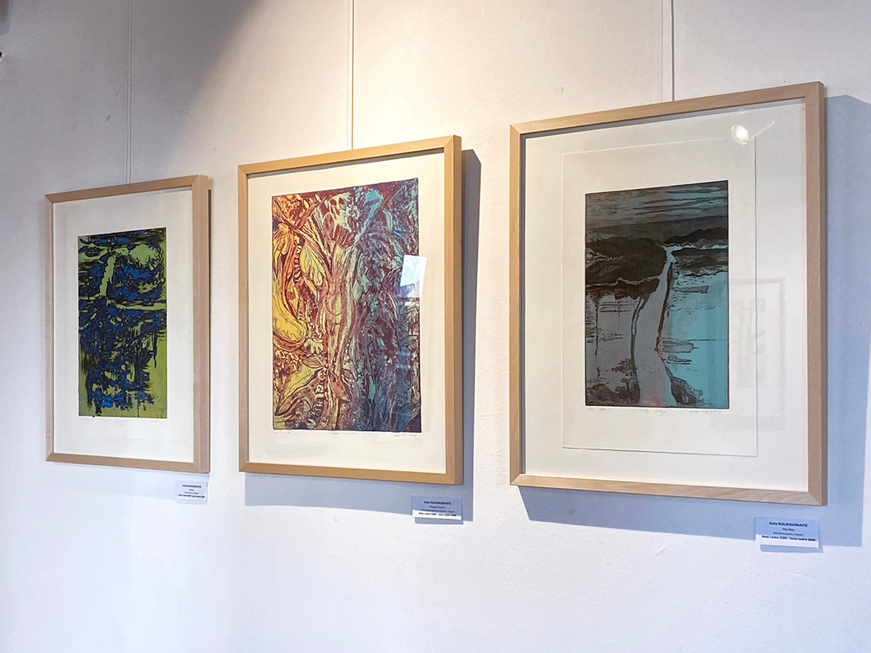 Three printmaking artworks by Asta Kulikauskaite Krivickiene hanging in the exhibition "DRUCKREIF: Empreinte stellt aus" in Steinsel, Luxembourg.