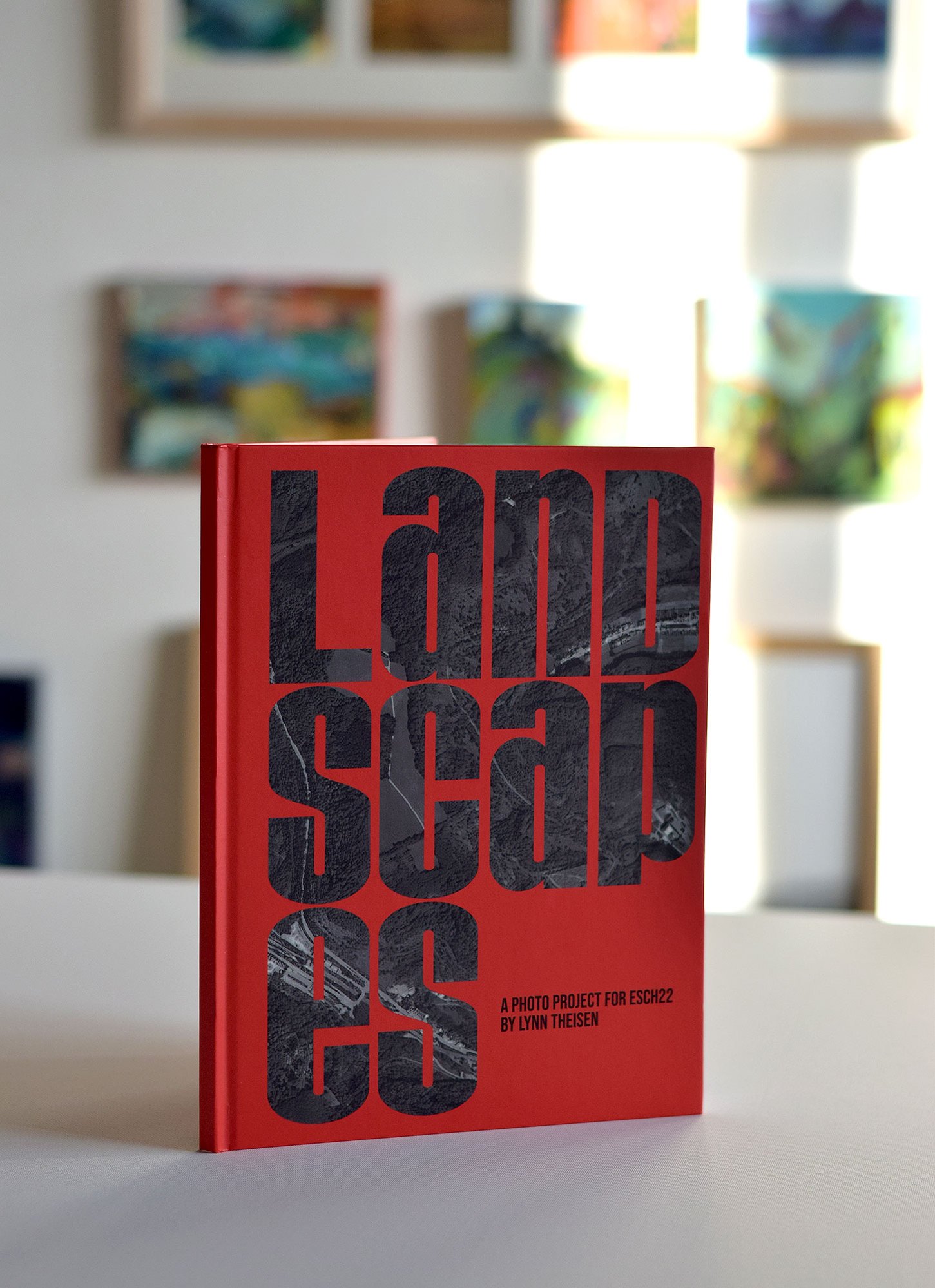 Project book LANDSCAPES by photographer Lynn Theisen, in the frame of Esch2022, European Capital of Culture 2022), paintings by Asta Kulikauskaite Krivickiene