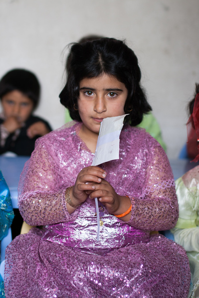 Colour portraits of children in festive clothing, photographed for UNICEF Iran in their kindergartens in West Azerbaijan, Iran.