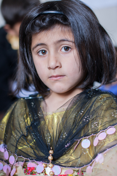 Colour portraits of children in festive clothing, photographed for UNICEF Iran in their kindergartens in West Azerbaijan, Iran.