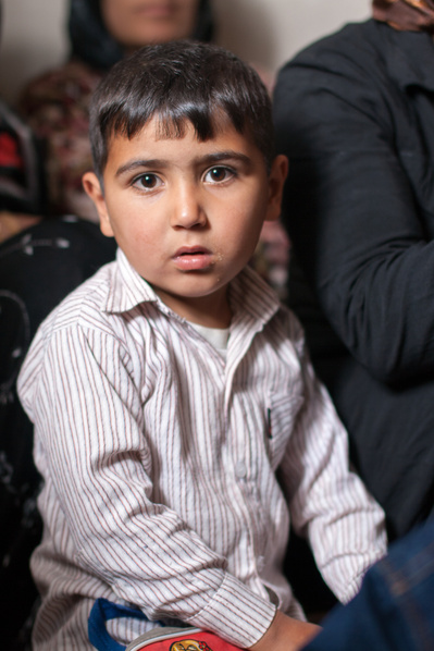 Colour portraits of children in festive clothing, photographed for UNICEF Iran in their kindergartens in West Azerbaijan, Iran.
