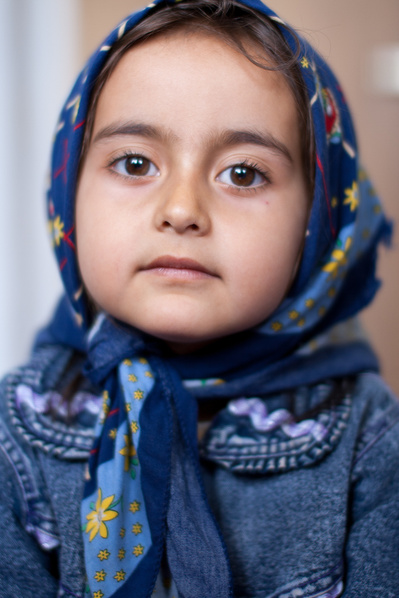 Colour portraits of children in festive clothing, photographed for UNICEF Iran in their kindergartens in West Azerbaijan, Iran.