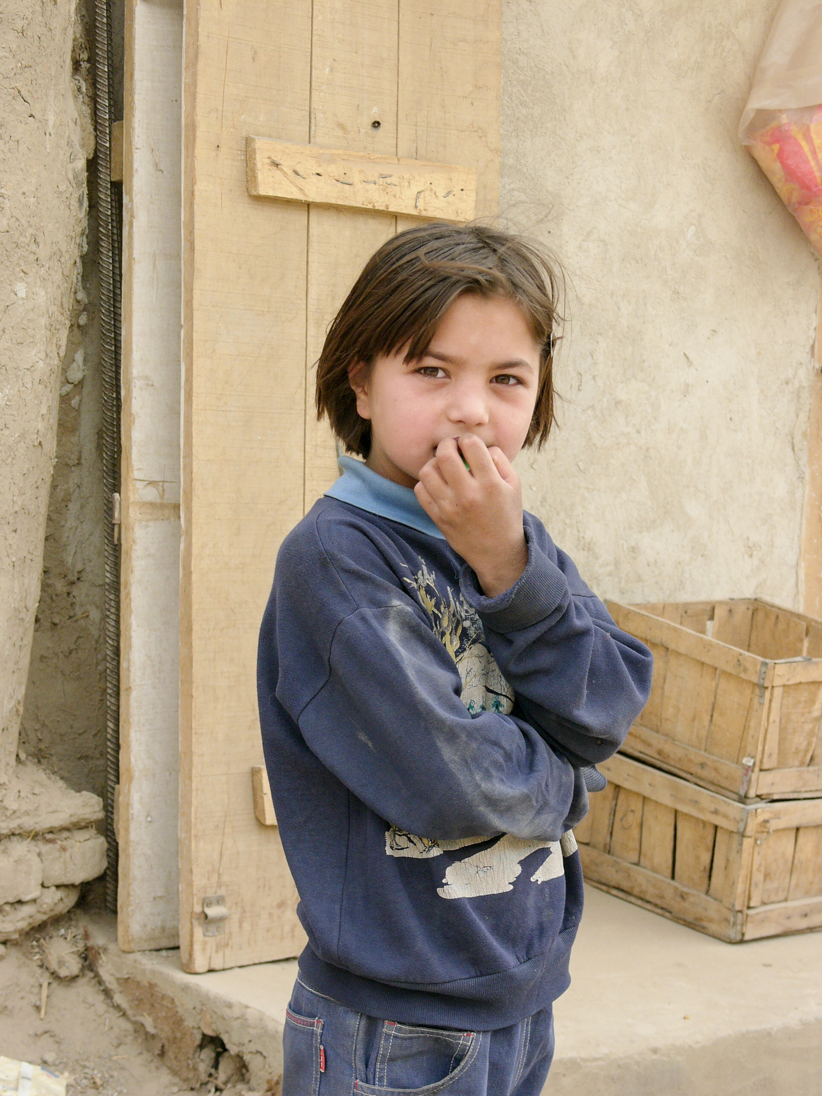 A child in Kabul, Afghanistan, looking into the camera.