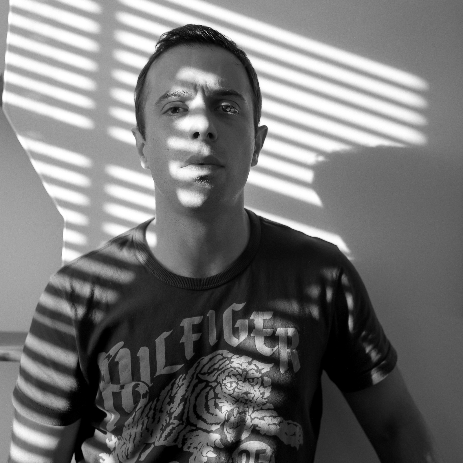 Black and white portrait of a young man.