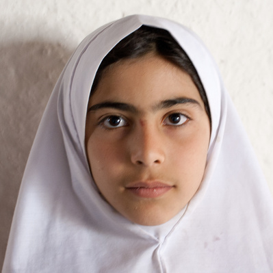 Colour portraits of children in festive clothing, photographed for UNICEF Iran in their kindergartens in West Azerbaijan, Iran.