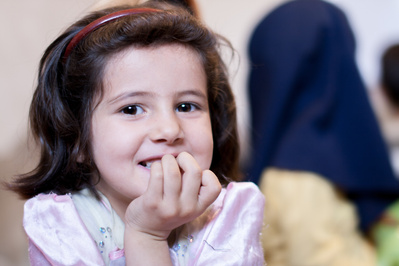 Colour portraits of children in festive clothing, photographed for UNICEF Iran in their kindergartens in West Azerbaijan, Iran.