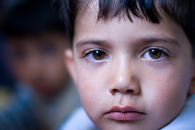 Colour portraits of children in festive clothing, photographed for UNICEF Iran in their kindergartens in West Azerbaijan, Iran.